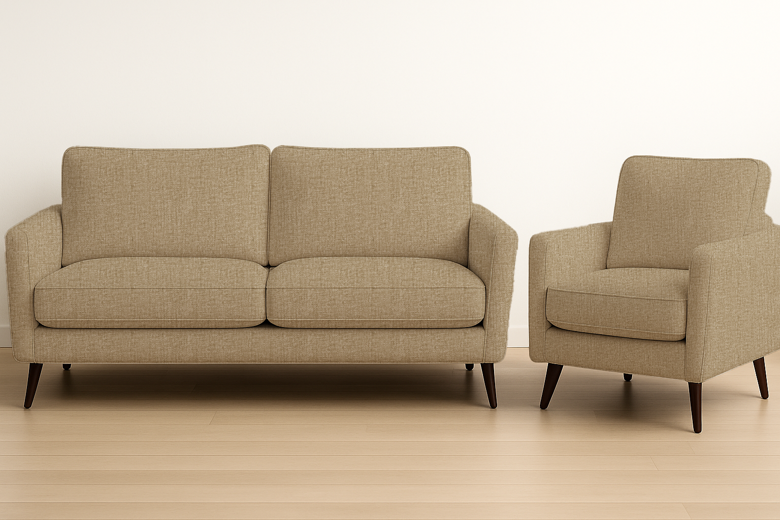 Beige sofa and armchair set on a wooden floor with a white background