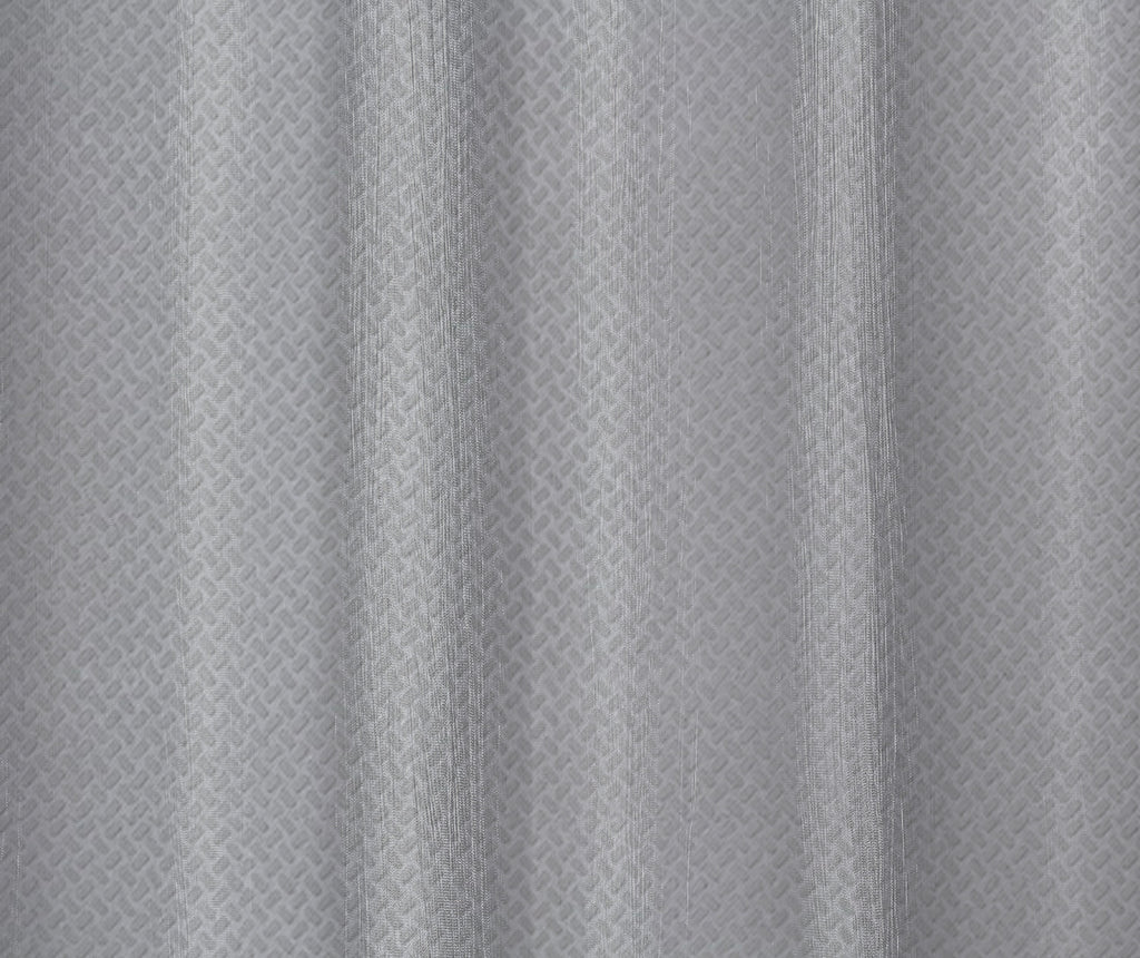 Close-up of textured gray fabric with a subtle pattern